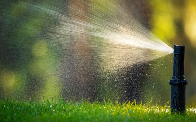 Image of a sprinkler experiencing common sprinkler problems - get quick efficient fixes with Hot Shot.