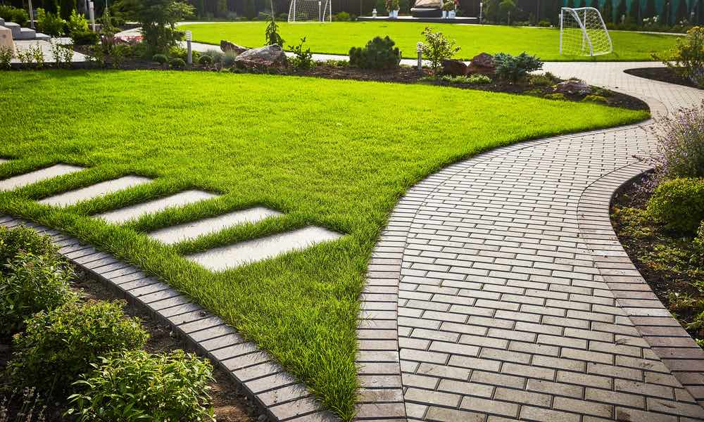 Hot Shot Sprinkler Repair & Landscape professional landscaping companies in Utah & Arizona stone pathway.